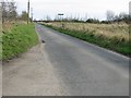 Saxon Shore Way footpath crossing a minor road.