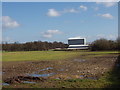 Field, view to buildings of Grove Farm