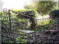 Fallen gate in Wimborne St Giles Churchyard