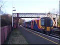 A train calling at Bursledon railway station