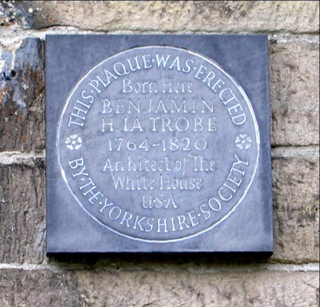 Plaque on wall of No 34 Fulneck