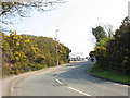 View up the slip road towards the car sales lot