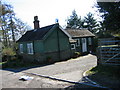 Wooden House at the entrance to Newbrough Lodge