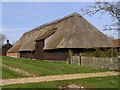 SU5620 : Thatched barn at Dean Farm by Jim Champion
