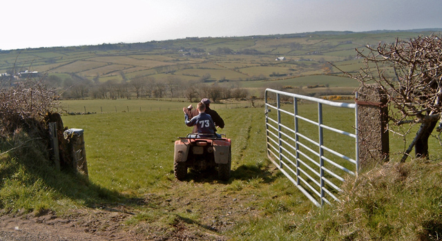 Farmer and son go to check the fences