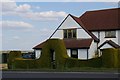 TL5175 : House on A10 on the outskirts of Stretham, with topiary by Fractal Angel