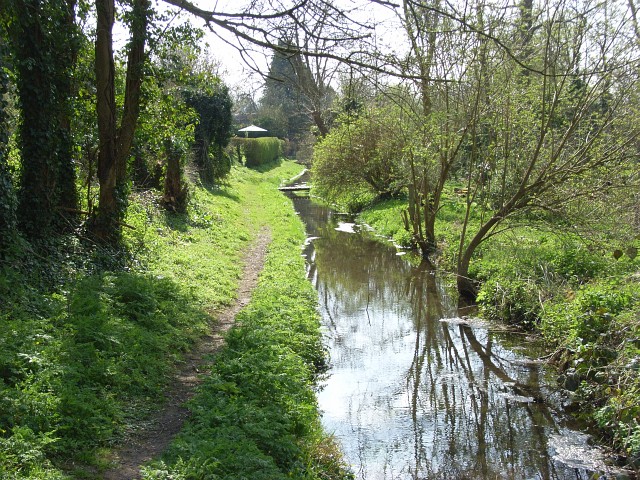 Stream, East Chisenbury With a public footpath alongside. Footbridges link cottages to their river frontages.