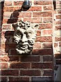 Sculpted mask on the Pavilion Hotel