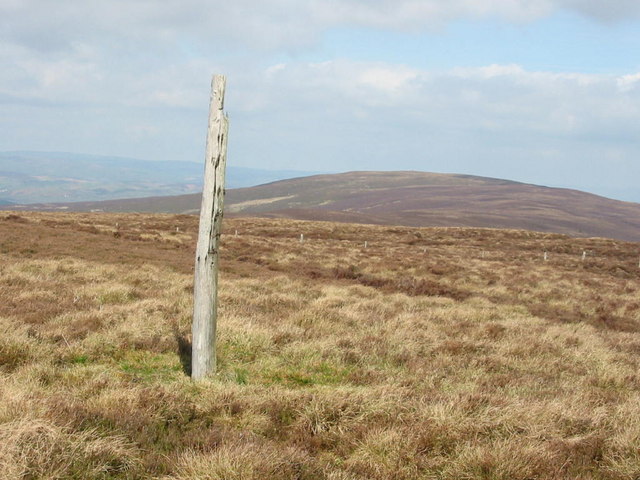 A pole marks the top