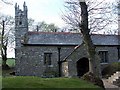 Tower and entrance to Cornelly Church.