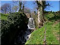 Waterfall feeding the River Cover . Note footpath to the right