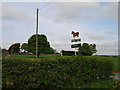 Whixley Grange Farm with appropriate sign in the foreground