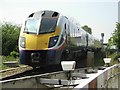 Eastbound train at Blackminster level crossing