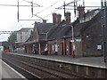 Lockerbie Station buildings on a grey day