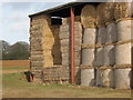 Dutch barn and straw bales at Bussock Barn