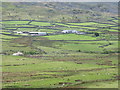 View across the in-by fields of Lower Cwm Ffrydan towards Parc Farm