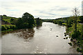 A "Brown flood" on the Mourne at Victoria Bridge.