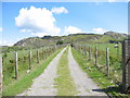 Farm road, with public access, leading to the moorland