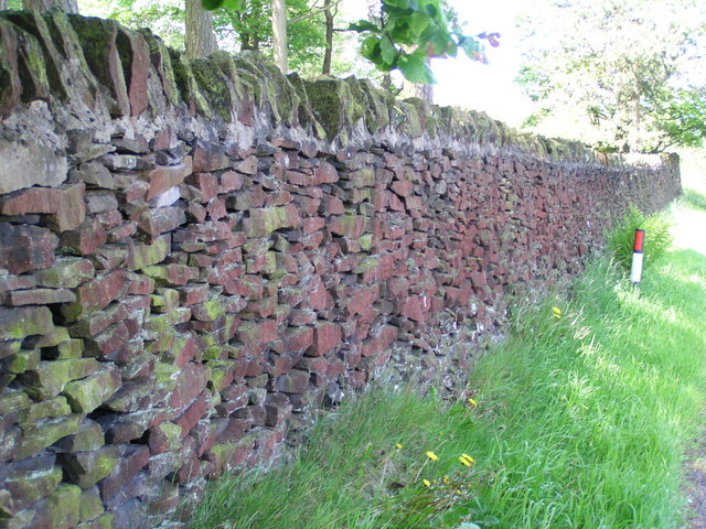 Red-coloured dry stone wall along Redcar Lane