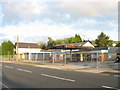 Disused service station and car showroom in Llanberis Road