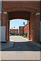 Consort Mews seen through the archway from West Mews, Knowle