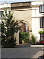 Carriage entrance to mews, Cornwall Gardens