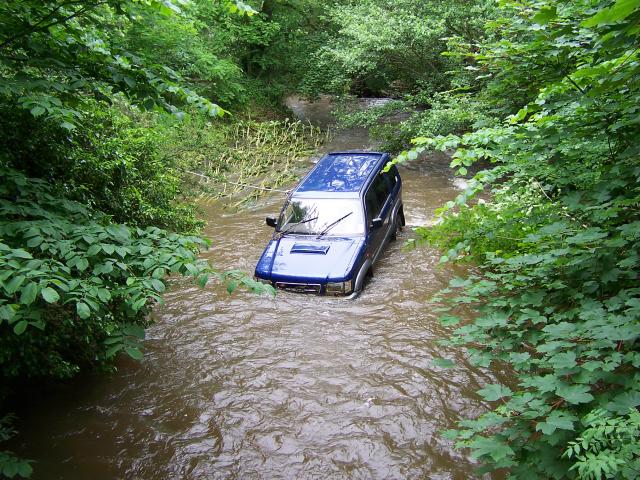 Car washed down from ford across Harden Beck