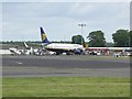 Aircraft in front of Airport Buildings