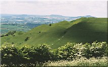 SY5494 : Hillfort slopes and broad view by Chris Downer