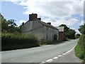 SJ3305 : Farm cottages in Little Worthen by John M