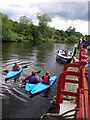 Canoes and boat use the landing stage