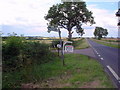 TL1266 : Three Shires Way signpost by Les Harvey