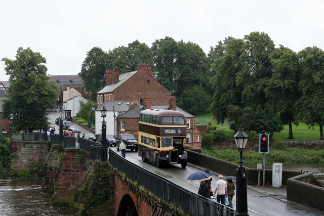 Historic bus on Old Dee Bridge in Chester