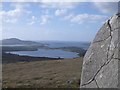 L7256 : Standing Stone on Diamond Hill Walk, with view over Ballynakill Harbour by Keith Salvesen