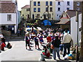 Morris dancers on the seafront