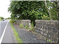 Damaged wall by Southbar Road