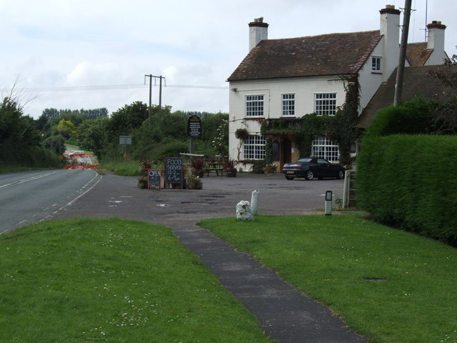 Hole in the road near the New Inn