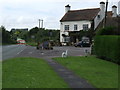 Hole in the road near the New Inn