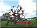 SH7036 : A Kuhn rotary rake at Tyddyn Felin by Eric Jones