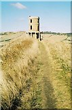 SY9078 : Kimmeridge: the South West Coast Path passes Clavell Tower by Chris Downer