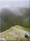 SH6765 : Looking back down the North East ridge by Ian Greig