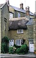 Sherborne: narrow thatched cottage