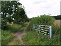 Gate to track at junction with footpath.