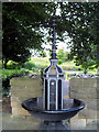 Cast iron fountain and lamp standard.