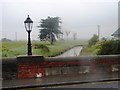 O2342 : Portmarnock Bridge in the Rain by Ian Paterson