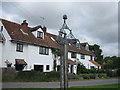 Large house by Swannington village sign