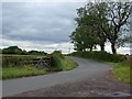 The road passing Oldhill Farm