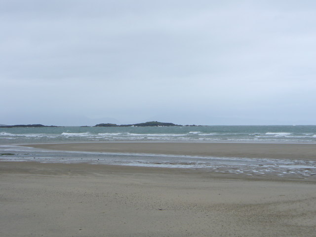 Cerrig y Gwyr from beach at Cymyran Bay