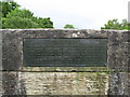 Plaque on bridge