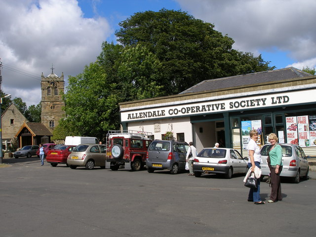 Across the Market place towards the Co-op and Parish Church of St Cuthbert